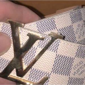 Used Louie belt , one added hole to fit most